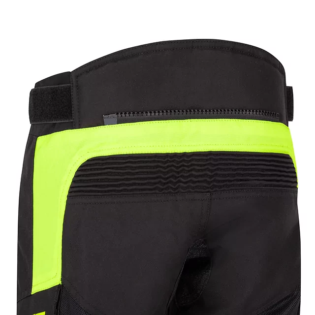 Regulowane dziecięce spodnie motocyklowe W-TEC Pinapoco ∙ ochraniacze kolan EN 1621-1 ∙ wentylacja mesh∙ odblaski ∙ zamek do kurtki - Czarny-fluo