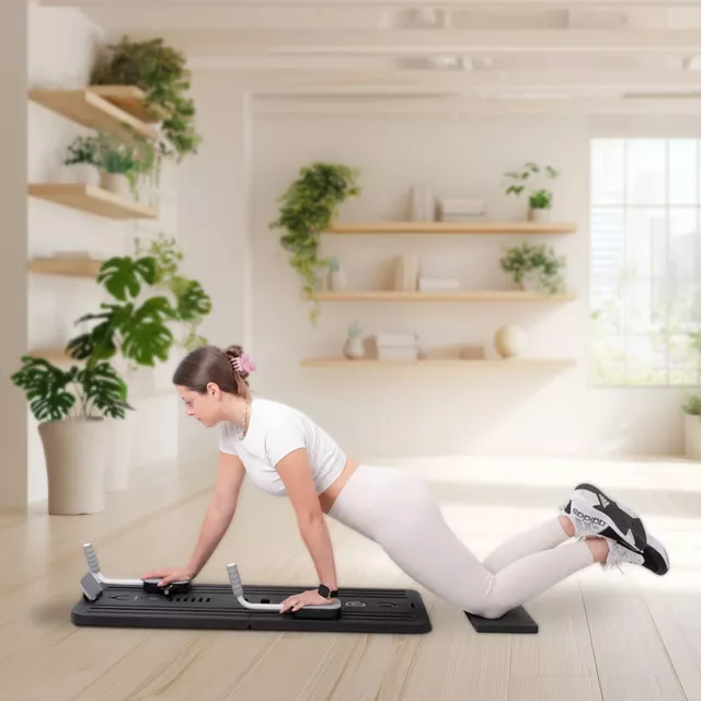 Reformer do pilatesu inSPORTline Trancer Basic ∙ antypoślizgowa deska ∙ składana konstrukcja ∙ stacja na telefon - Czarny