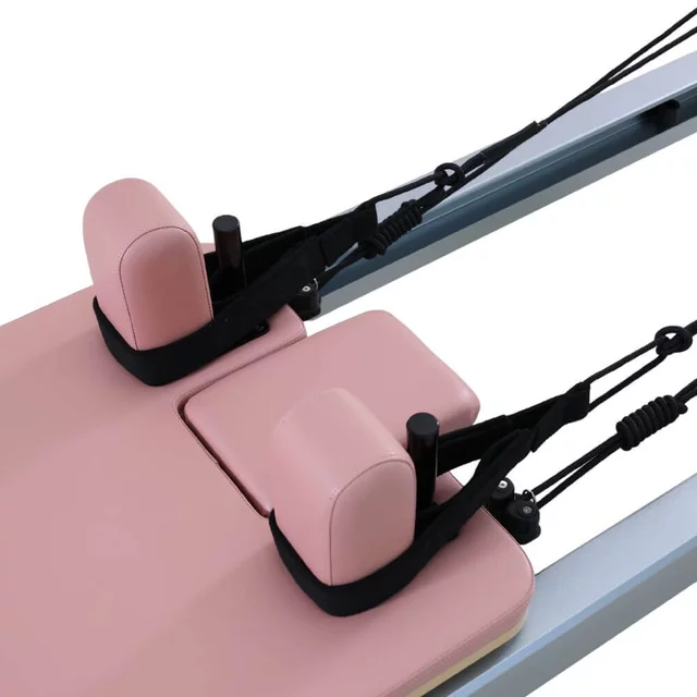 Reformer do pilatesu inSPORTline Oquiler ∙ system sprężynowy ∙ nośność 150 kg ∙ rama aluminiowa ∙ box w zestawie - Różowy