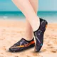 Buty kąpielowe inSPORTline Granota ∙ unisex ∙ ochrona przed jeżowcami ∙ waga 125 g ∙ szybkoschnące ∙ perforowane podeszwy ∙ antypoślizgowa podeszwa - Czarny/pomarańczowy