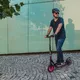 Hulajnoga miejska inSPORTline Discola ∙ amortyzacja ∙ hamulec tarczowy + nożny ∙ koła 230/200 mm ∙ nośność 100 kg ∙ rama aluminiowa - Czerwony