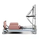 Reformer do pilatesu inSPORTline Oquiler ∙ system sprężynowy ∙ nośność 150 kg ∙ rama aluminiowa ∙ box w zestawie - Różowy