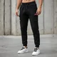Spodnie dresowe cargo inSPORTline Signature ∙ unisex ∙ pojemne kieszenie ∙ mocny ściągacz - Czarny - Czarny